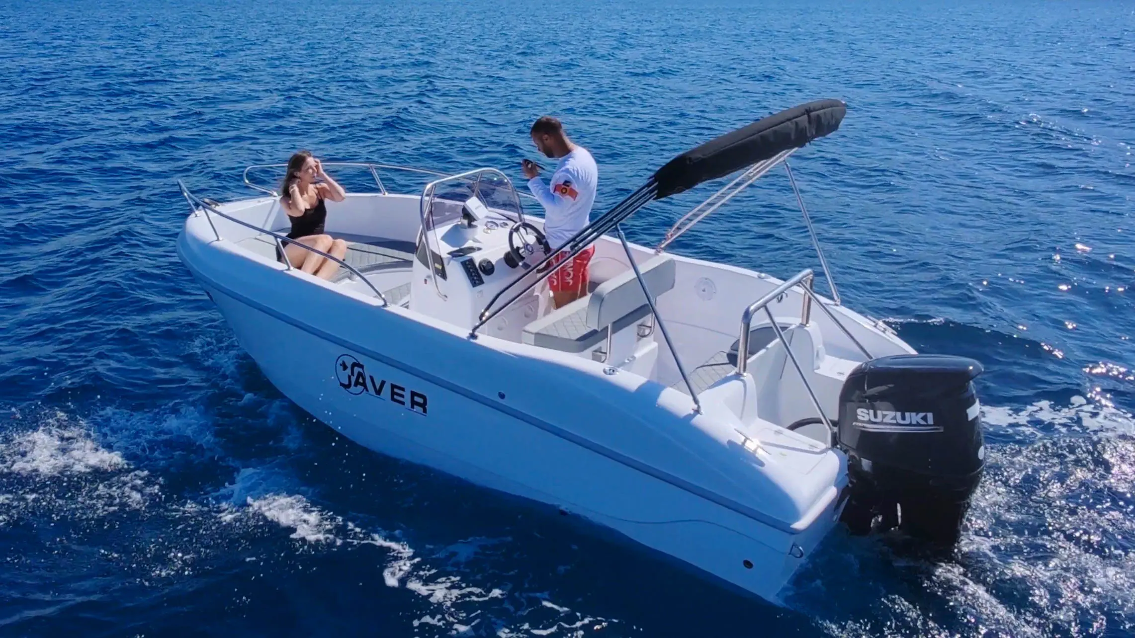 Rear aerial view of the Saver 19 rental boat on the Adriatic Sea
